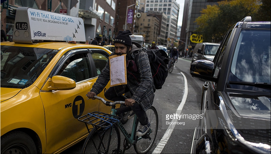 2016-11-11 11_28_47-As Uber Offers Bagels by Bike, NYC Couriers Seek More Pay Photos and Images _ Ge
